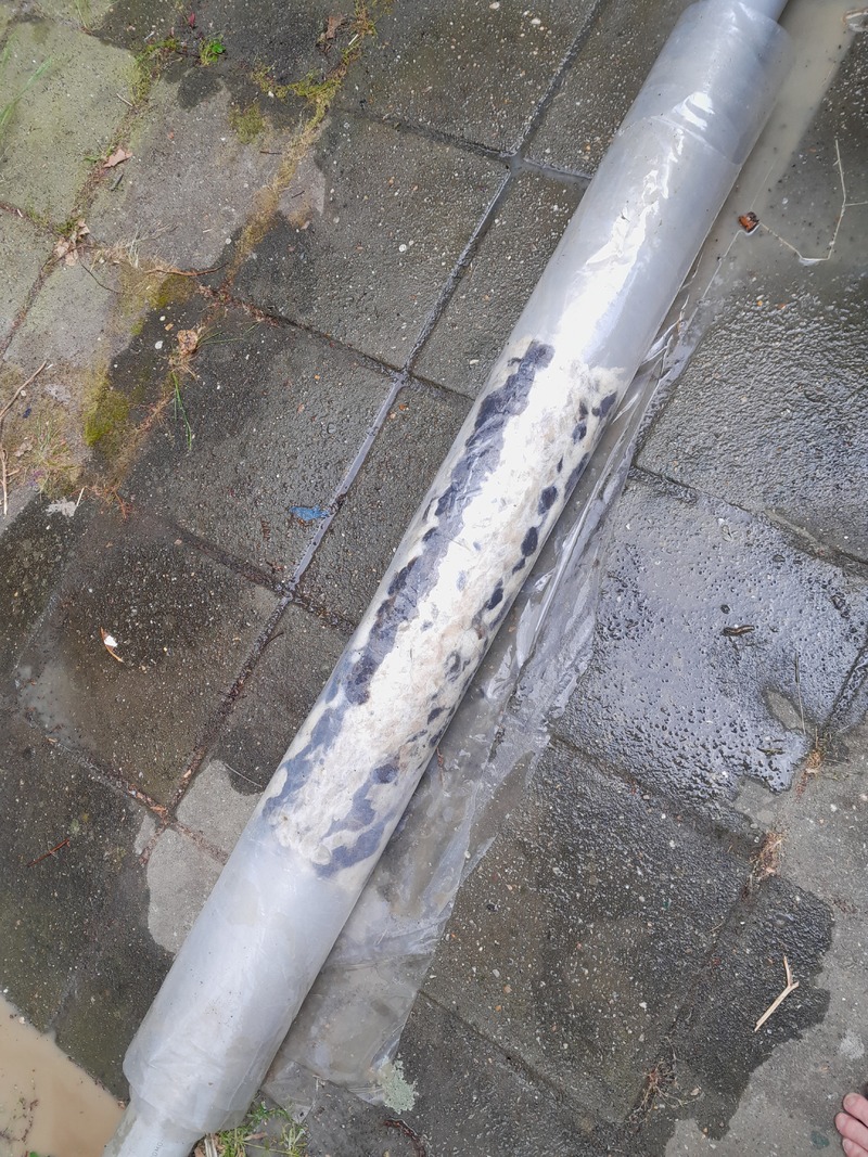 Rug wrapped in plastic